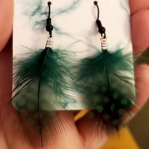 Forest green & black feather drop handmade earrings. $Firm.